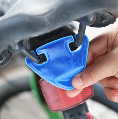 Reflécteur haute visibilité pour selle de vélo